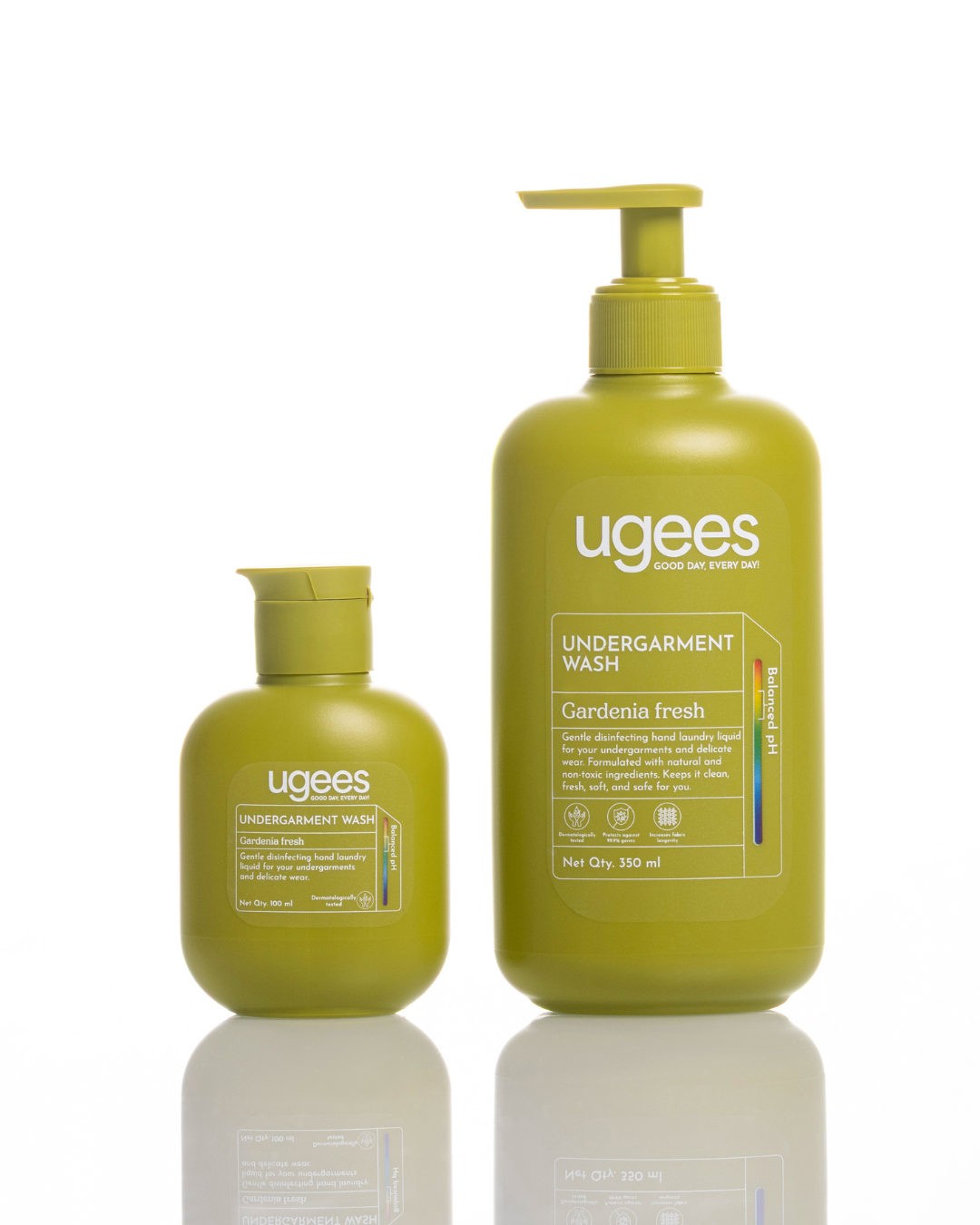 Two Ugees Undergarment Wash bottles in a matching olive green color, one 350 ml pump bottle and one 100 ml pump bottle, displayed on a reflective white surface against a white background.