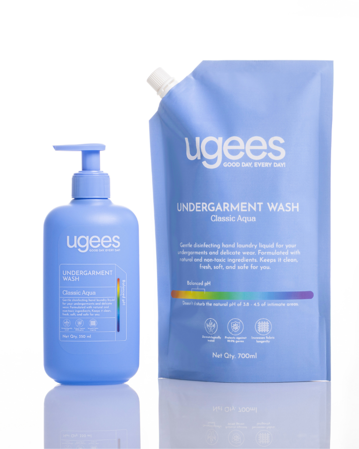 Ugees Undergarment Wash Classic Aqua set featuring a 350ml pump bottle and a 700ml refill pouch, both in a light blue color with white text and a small rainbow accent strip.